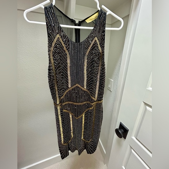 ⭐️Stunning⭐️ Nicole Miller holiday dress with intricate bead work. - Picture 2 of 3